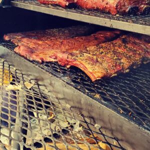 slow smoked ribs on a smoker