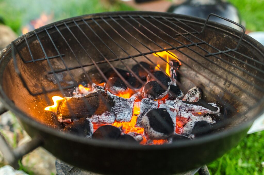 charcoal burning on weber kettle grill